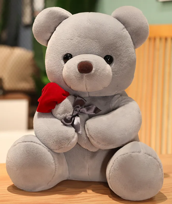 Oreiller peluche ours en peluche avec roses enlacées