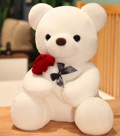 Oreiller peluche ours en peluche avec roses enlacées